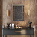 Matte bronze 2.5x10 ceramic subway tiles on bathroom wall
