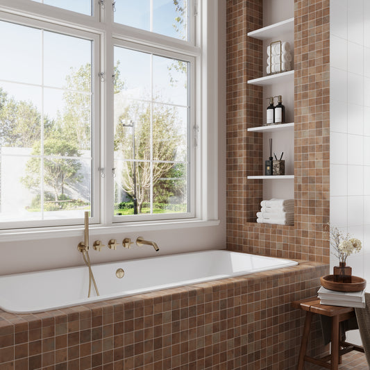 taupe 2x2 matte recycled glass corner tiles installed around bathtub and wall niche