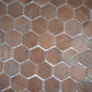 taupe matte recycled glass hexagon mosaic tile with varied taupe shades and subtle texture