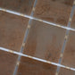 Taupe 12x12 matte recycled glass square mosaic tile with subtle textured finish