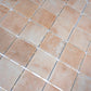 matte clay beige 12x12 recycled glass square mosaic tile arranged in grid pattern