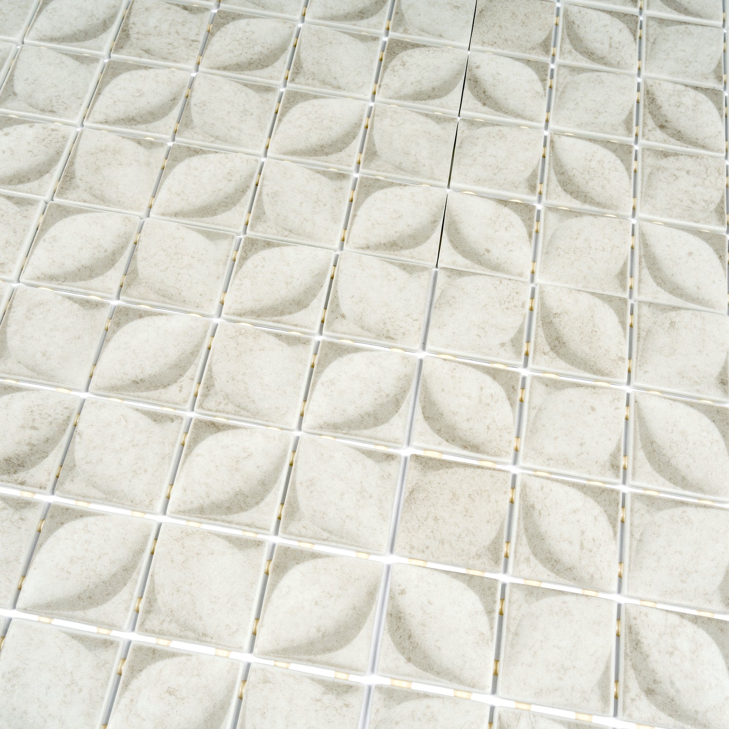 Beige 12x12 matte recycled glass square mosaic tiles with subtle leaf pattern, 10.6 sq ft per case