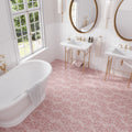 Blush pink hexagon porcelain tile with matte terrazzo finish on bathroom floor