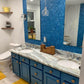 Cerulean blue 11x11 glossy and matte square glass mosaic tile wall in bathroom vanity backsplash
