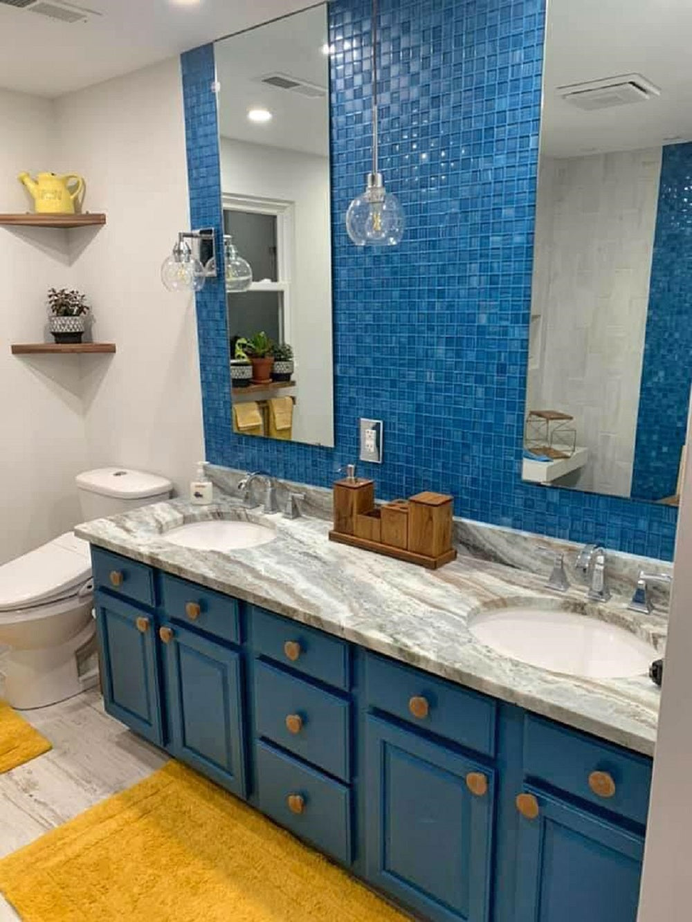 Cerulean blue 11x11 glossy and matte square glass mosaic tile wall in bathroom vanity backsplash