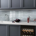 White 12x12 linear glossy and matte glass mosaic tile backsplash in kitchen area