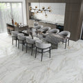 Polished white porcelain floor tiles with gray and golden veins, 24x48 large format in kitchen setting