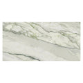 matte porcelain tile with soft white background and subtle sage green veins 24x48 large format
