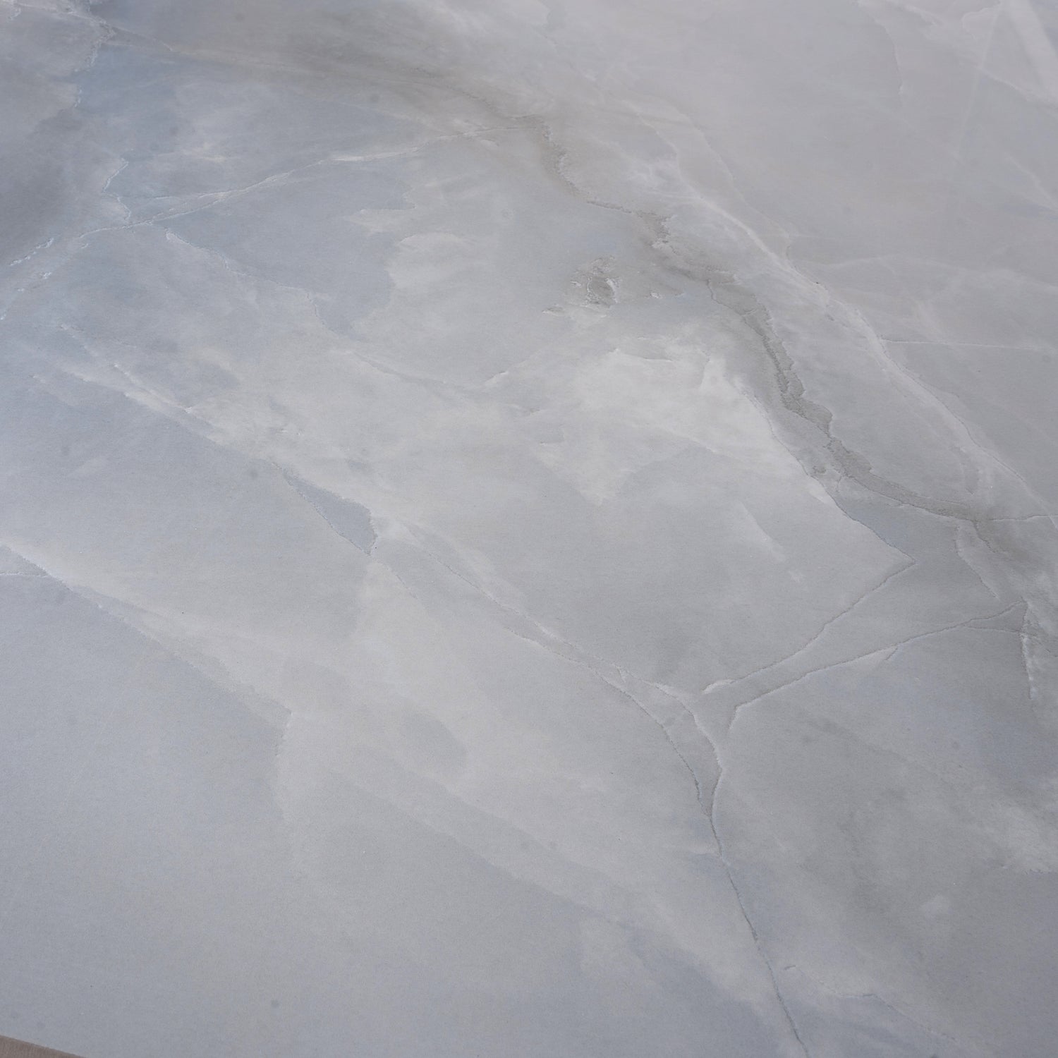 Celestine Blue 24x48 honed porcelain tile with subtle blue and gray veining for elegant flooring