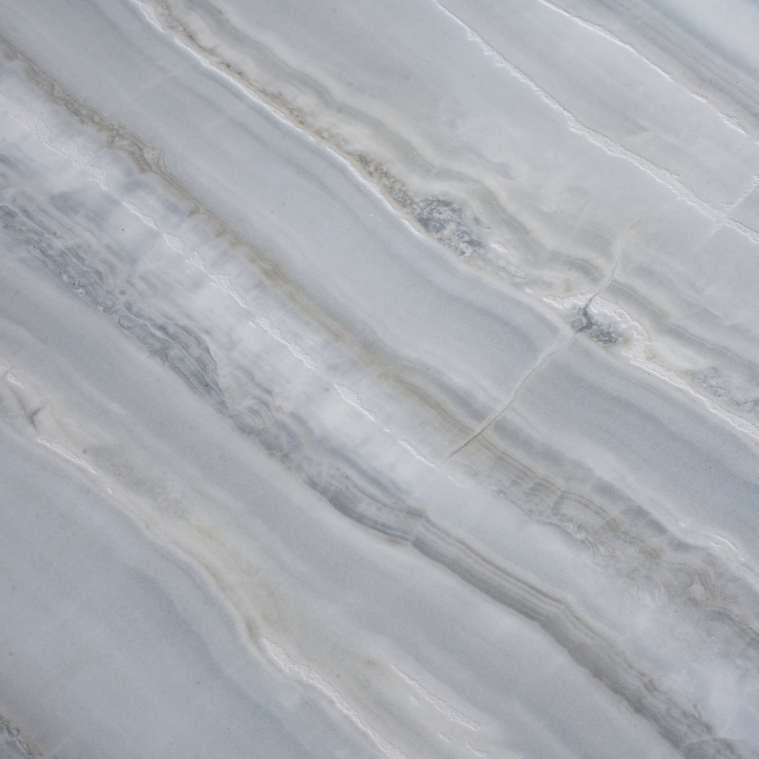 windy blue 24x48 honed porcelain large tile with soft blue and grey natural stone veining
