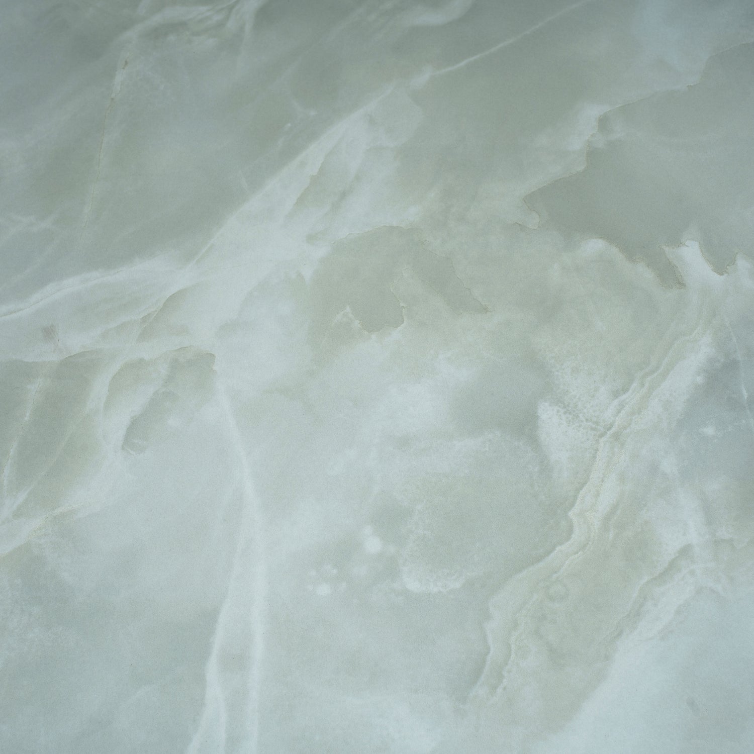 soft jade green honed porcelain large tile with natural stone-like texture 24x48 inches