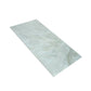 Soft jade green 24x48 inch honed porcelain tile with subtle marble veining large format