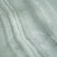 Sage jade green honed porcelain large tile with natural subtle veining and smooth matte finish