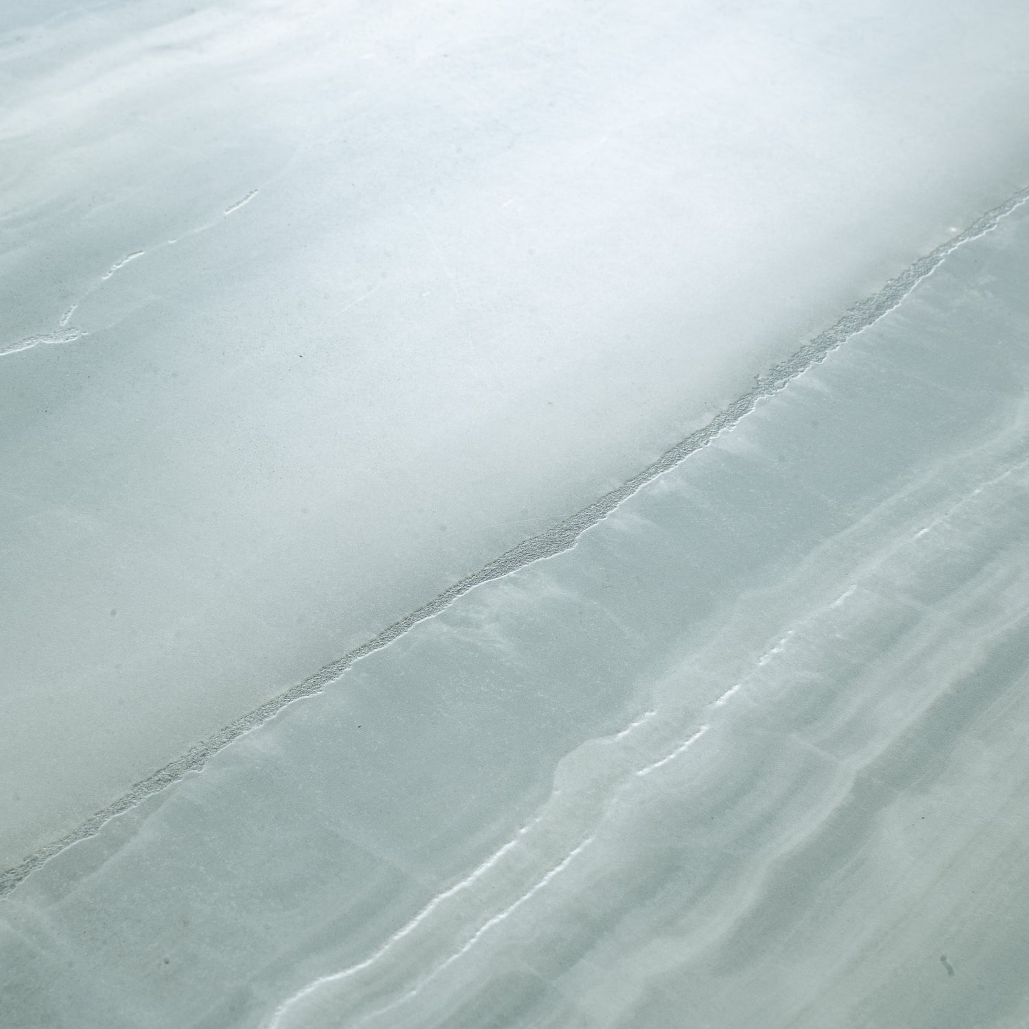 sage jade green honed porcelain large tile with smooth textured surface and subtle veining