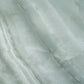 Sage jade green 24x48 honed porcelain large tile with subtle natural veining in green tones