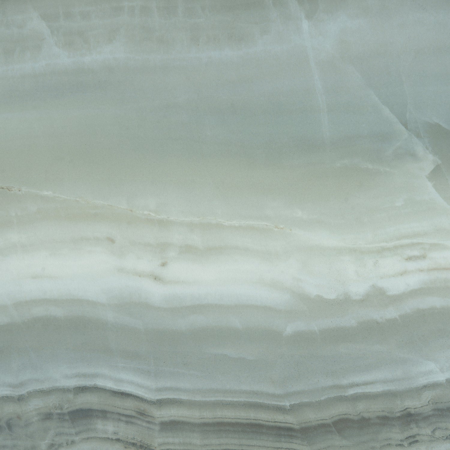 Sage jade green honed porcelain large tile with subtle natural veining, 24x48 inch size