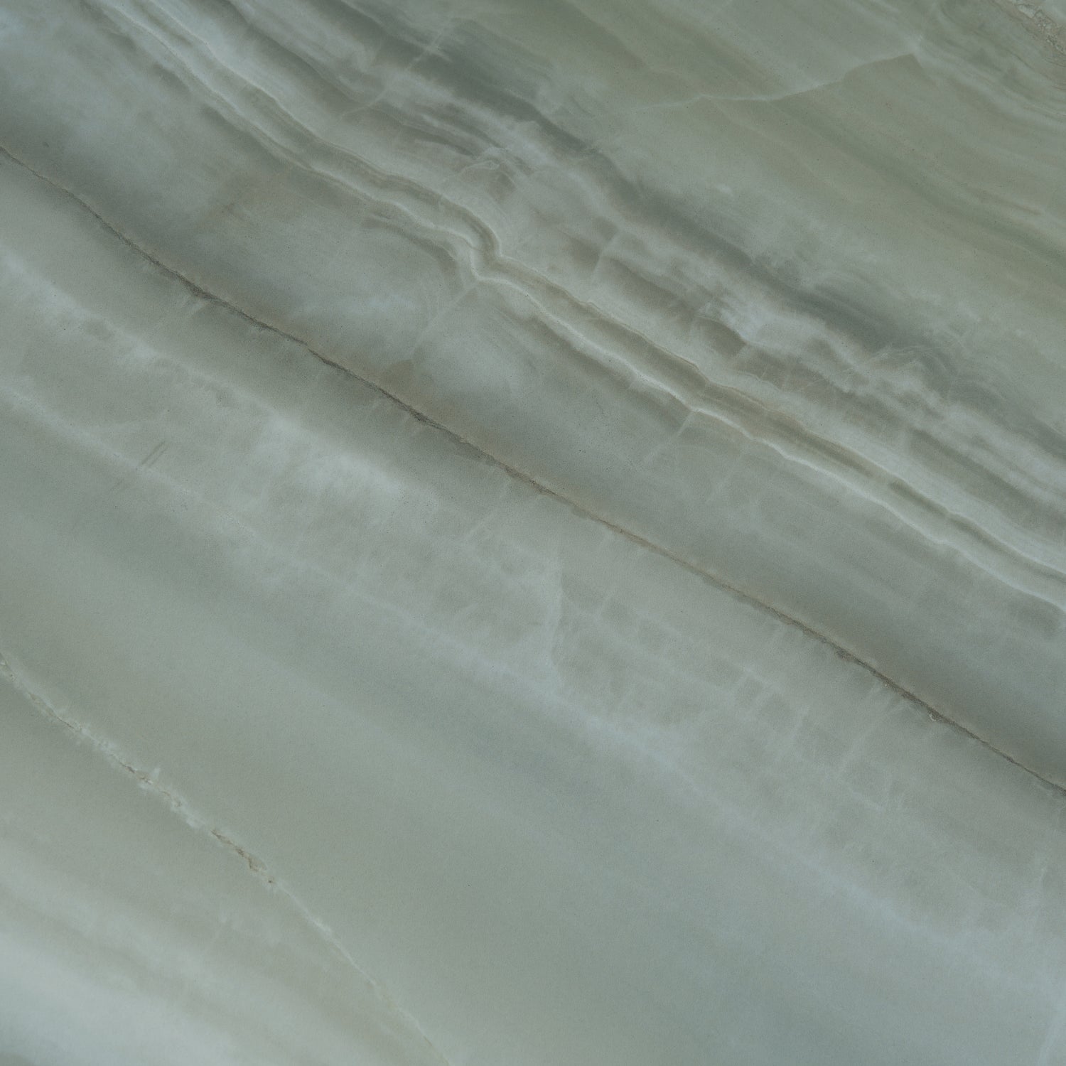 Sage jade green 24x48 honed porcelain tile with smooth textured natural stone appearance