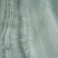 Sage jade green 24x48 honed porcelain tile with subtle veining and smooth finish