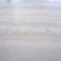 Ivory white 24x48 honed porcelain large tile with natural subtle veining and smooth finish
