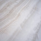 Ivory white large porcelain tile 24x48 inches with honed finish featuring subtle natural veining