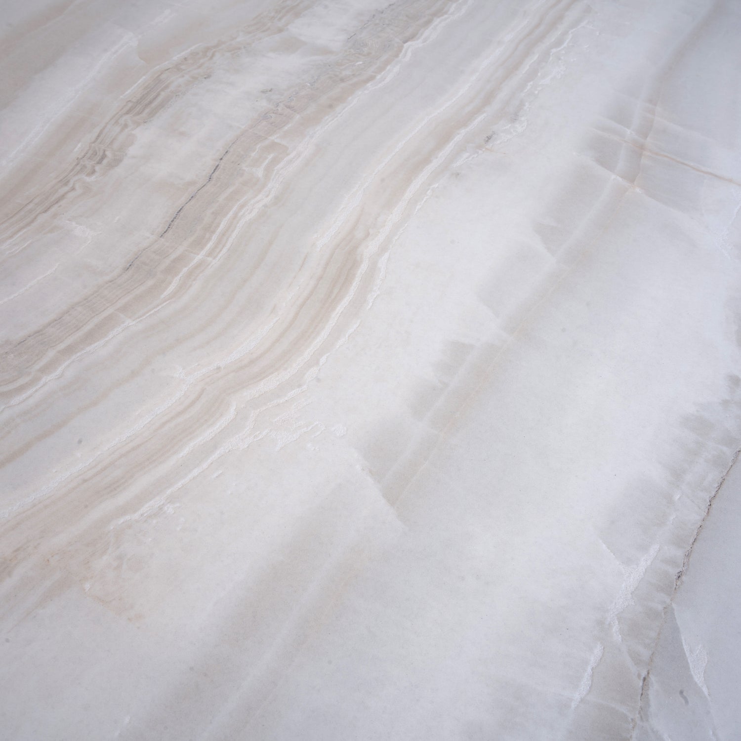 Ivory white large porcelain tile 24x48 inches with honed finish featuring subtle natural veining