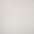 white glossy large porcelain tile with subtle dandelion pattern and linear texture