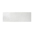 Off-white ceramic large format tile with textured trowel plaster style in 12x36 size