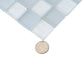Close-up of glossy and matte gray 11x11 glass mosaic tiles in square shapes