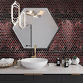 Berry red hexagon glass mosaic tile with glossy matte finish on bathroom wall