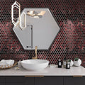 Berry red hexagon glass mosaic tile with glossy matte finish on bathroom wall backsplash