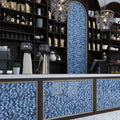 Blue hexagon glass mosaic tile with glossy matte finish as kitchen backsplash and counter front panels