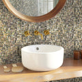 Beige and brown polished mother of pearl mosaic tile wall in bathroom backsplash