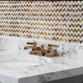 Brown and white polished mother of pearl herringbone mosaic tile on bathroom wall