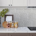 polished white marble basketweave mosaic tile backsplash with gray grout in kitchen wall