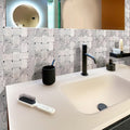Bianco Carrara polished marble basketweave mosaic tile with eastern beige dots on bathroom backsplash