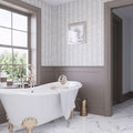 Polished Bianco Carrara Eastern beige marble herringbone mosaic tile on bathroom wall