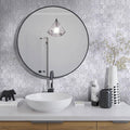Polished white Bianco Carrara marble hexagon tile on bathroom wall
