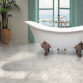 White Bianco Carrara polished hexagon marble tile floor with subtle veining, 10x12 inches size