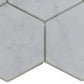 white honed marble hexagon mosaic tile with subtle gray veining close-up