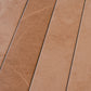 Sunbaked terracotta 3x24 matte porcelain plank tile with natural stone texture in warm earthy tones