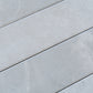 Soft grey matte porcelain plank tile 3x24 inch with subtle textured surface and natural stone look