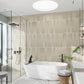 soft taupe 3x24 matte porcelain plank tile arranged vertically on bathroom wall