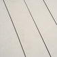 Soft white matte porcelain plank tile in 3x24 inch size with subtle texture and light veining