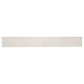 Soft white 3x24 matte porcelain plank tile with subtle texture and natural stone look
