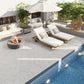 soft white matte porcelain plank tile laid in herringbone pattern on outdoor patio