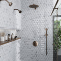 White Bianco Carrara glass and marble hexagon mosaic tile with polished and etched finish on shower wall