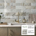 white polished Calacatta Gold marble subway tile backsplash with gold veining, 4x12 rectangular tiles
