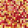 Glossy red and yellow 12x12 square glass mosaic tiles with varied shades and reflective finish