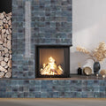 Glossy spruce blue 4x4 ceramic square tiles on fireplace wall and base