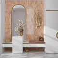 Pink glossy ceramic subway wall tile 2.5x8 inches installed on interior wall